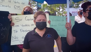 Viudas de polic&iacute;as amenazan con irse a huelga de hambre si no quitan el veto a Ley