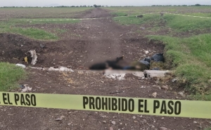 &iexcl;Quemado! Descubren cuerpo sin vida de un joven en un dren del Ejido Can&aacute;n, en Culiac&aacute;n